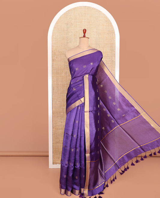 Violet Banana Pith Saree Spotlighted with Square Zari Buttas All Over Its Body, Bavanji Border, Gleaming Zari Striped Pallu, and Paired with a Matching Plain Blouse