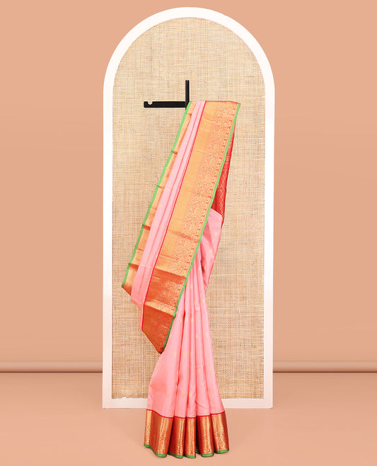 Pink Vasundhara Silk Saree, Decked Up with Zari Buttas and Stripes All Over Its Body, Complemented by a Contrast Border of Rekku, Kodi Visiry, Jaal, and Mayil Designs, Grand Jaal Pallu, and Paired with a Contrast Blouse