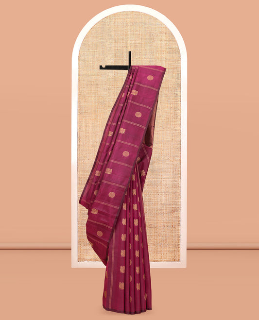 Borderless Purple Vasundhara Silk Saree, Artfully Detailed with Mayil and Chakram Buttas, Grandly Woven Pallu, and a Matching Blouse