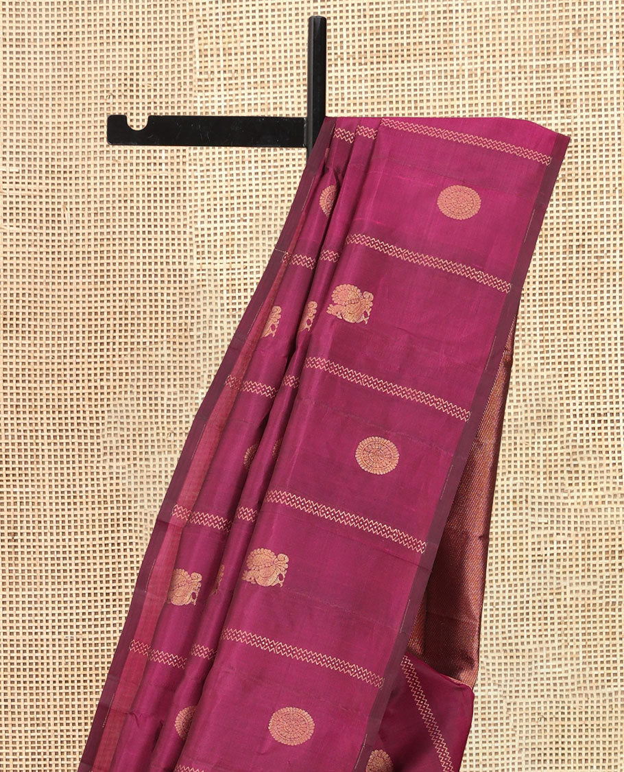 Borderless Purple Vasundhara Silk Saree, Artfully Detailed with Mayil and Chakram Buttas, Grandly Woven Pallu, and a Matching Blouse
