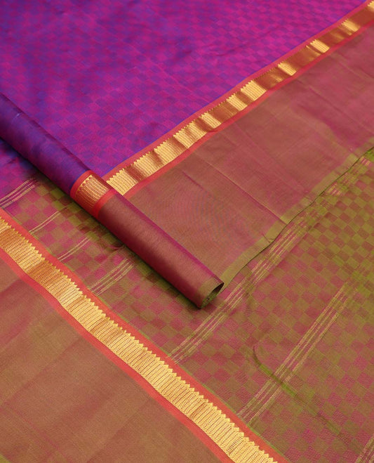 Violet paiyadi kattam Kanchipuram silk saree, contrast border of rekku, and vanki designs, and sparsely checked pallu