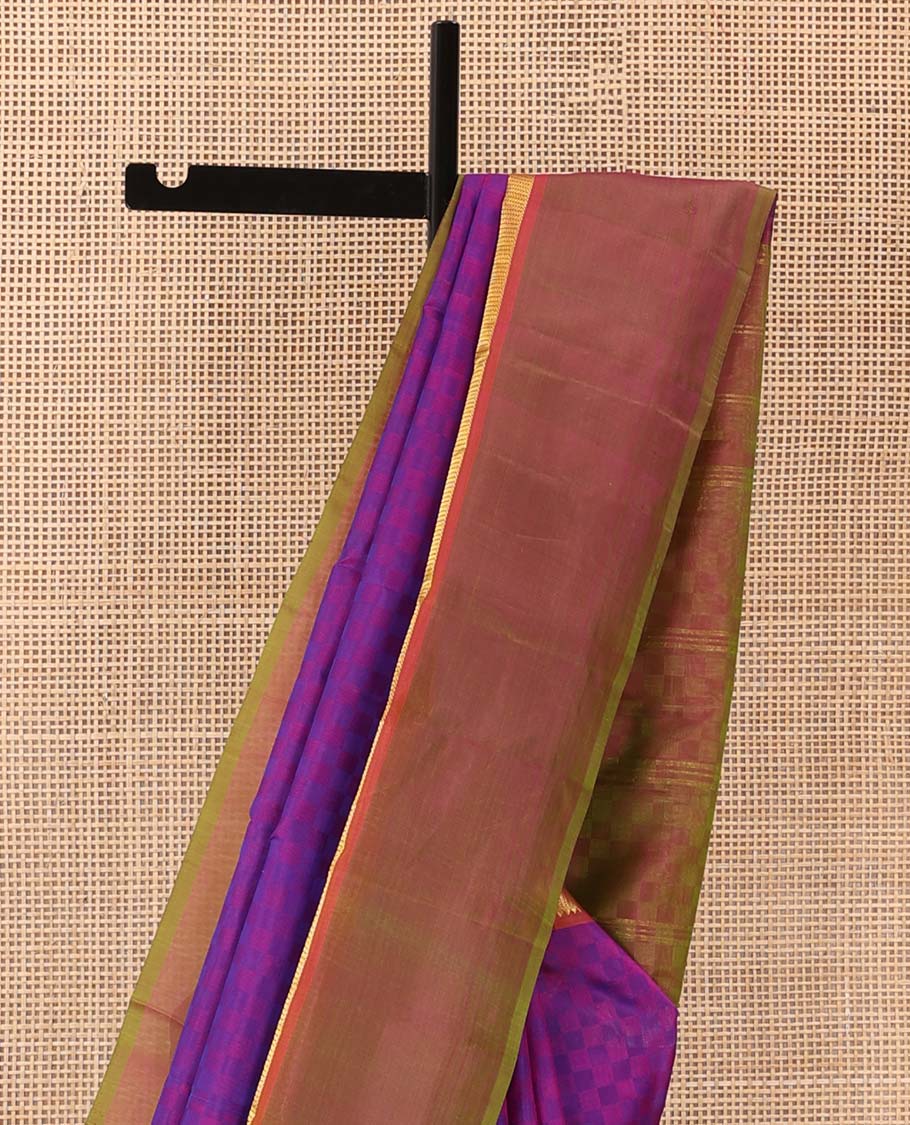 Violet paiyadi kattam Kanchipuram silk saree, contrast border of rekku, and vanki designs, and sparsely checked pallu