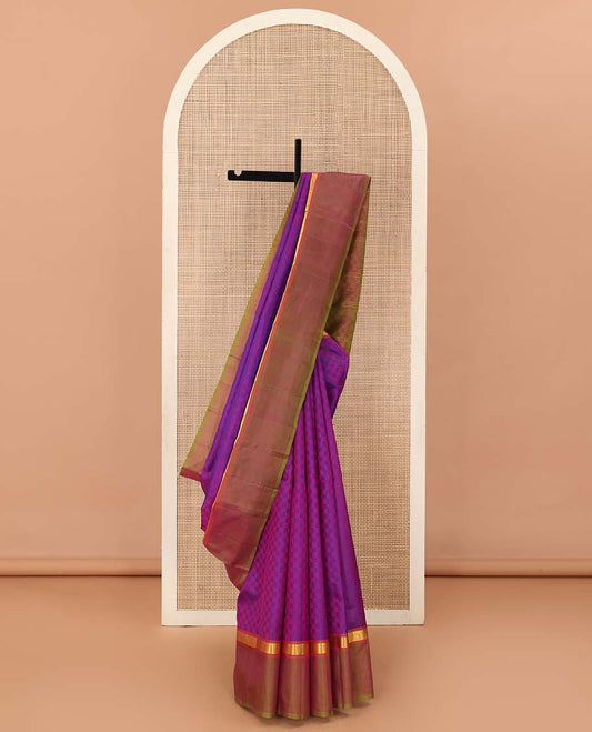Violet paiyadi kattam Kanchipuram silk saree, contrast border of rekku, and vanki designs, and sparsely checked pallu