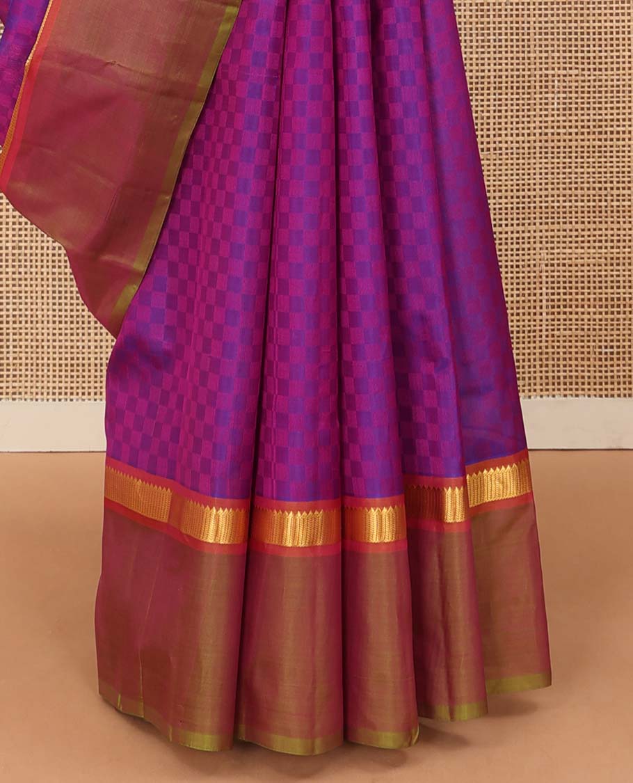 Violet paiyadi kattam Kanchipuram silk saree, contrast border of rekku, and vanki designs, and sparsely checked pallu