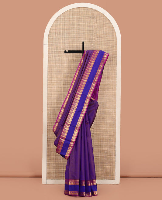Brown Kanchipuram Silk Saree Adorned with Vazhaipoo Stripes, Complemented by a Contrast Rettai Pettu Border of Thilakam Mokku, Muthu, Neli, and Thazampoo Rekku Designs, Sparsely Woven Pallu, and Paired with a Contrast Blouse