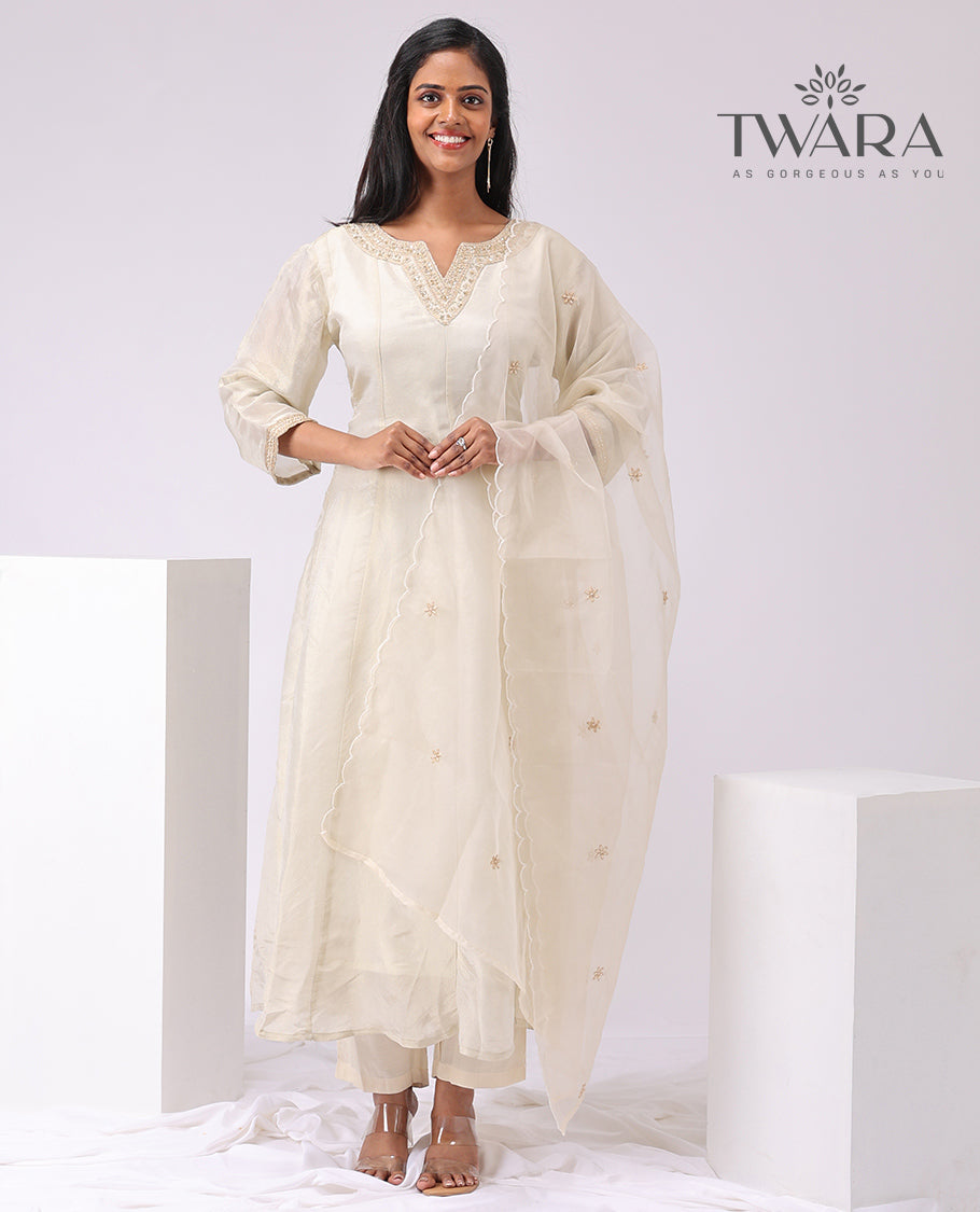 Twara cream floral embroidered v neck, 3/4 th sleeve , below knee lenght with straight pant & scallop border dupatta