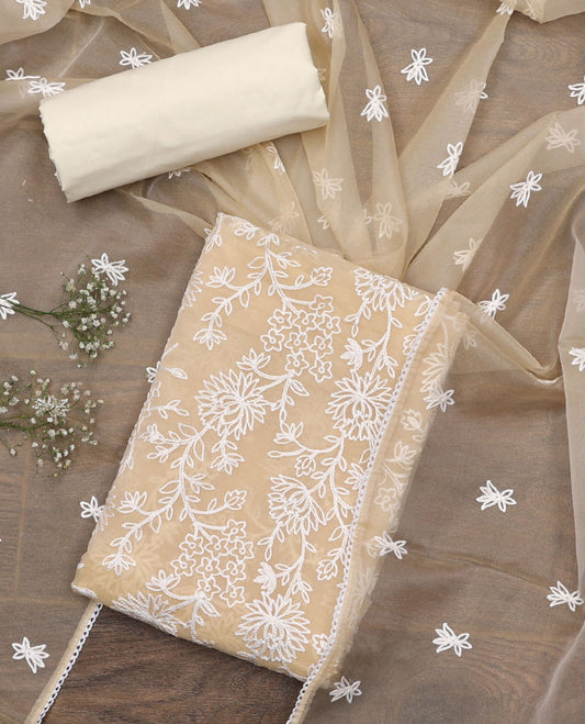 Pastel yellow material chudidar set, floral vine chikankari style embroidered top, plain bottom, and organza dupatta of floral motifs embroidery