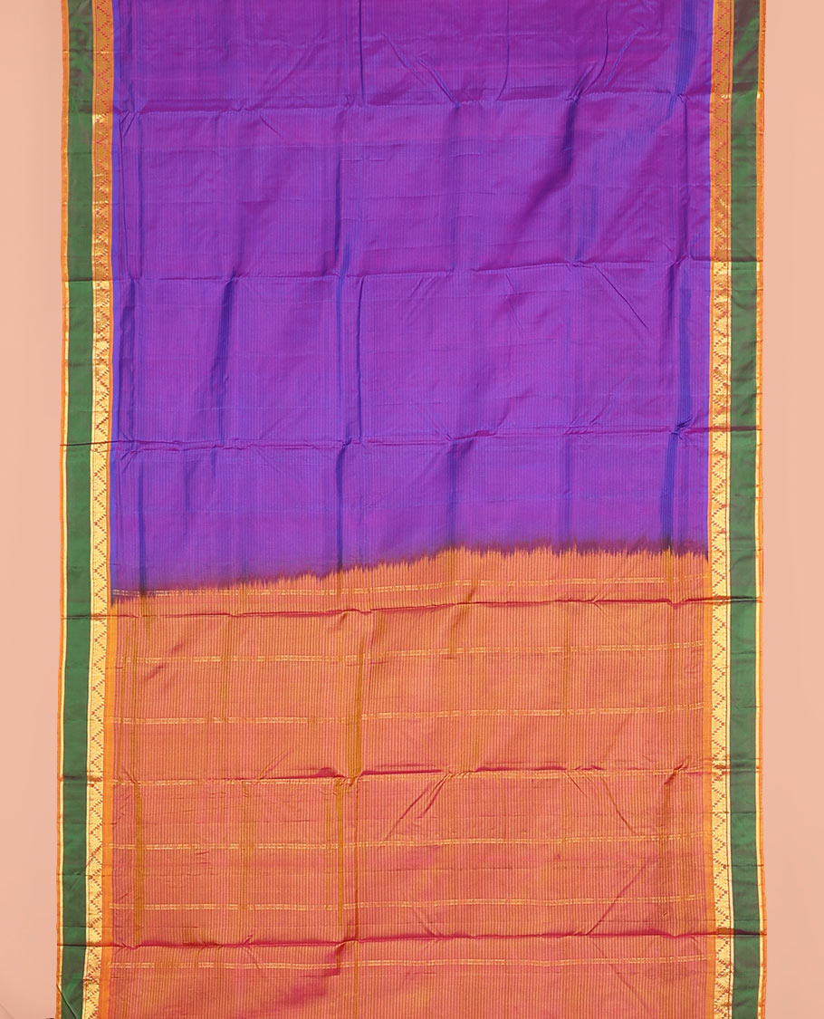 Violet striped nine-yard silk saree, contrast rettai pettu border of thazampoo rekku and kathir designs, and zari striped pallu