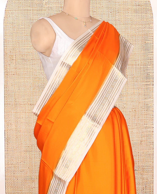 Orange Plain Mysore Silk Saree, Complemented by a Contrast Traditional Zari Border, Zari Design Pallu, and a Contrast Blouse