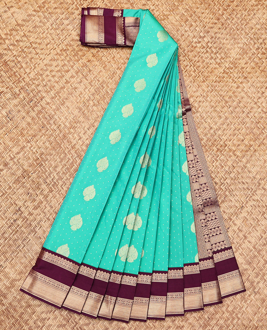 Turquoise Budget Silk Saree, Mesmerized with Zari Buttas, Complemented by a Contrast Traditional Zari Rettai Pettu Border, Grand Pallu, and a Contrast Blouse
