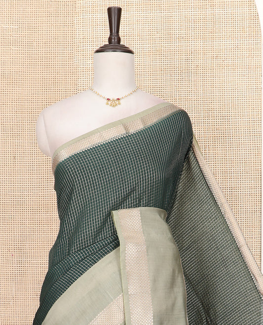 Dark Green Assam Silk Saree Sparsely Sparkled with Zari Checks, Complemented by Contrast Zari Border of Triangle Motifs, a Gleaming Pallu of Zari Stripes, and Paired with a Contrast Blouse