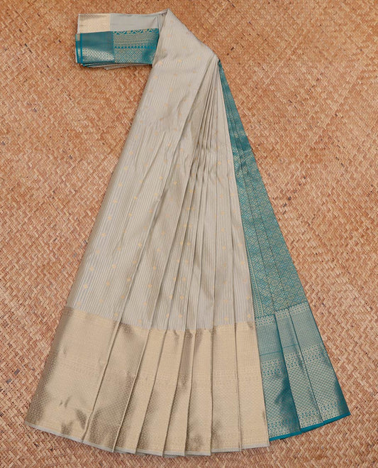 Grey Budget Silk Saree, Accentuated With Zari Buttas and Stripes All Over Its Body, Highlighted by Traditional Zari Designs Woven Border, Contrast Jaal Pallu and Paired with a Contrast Blouse