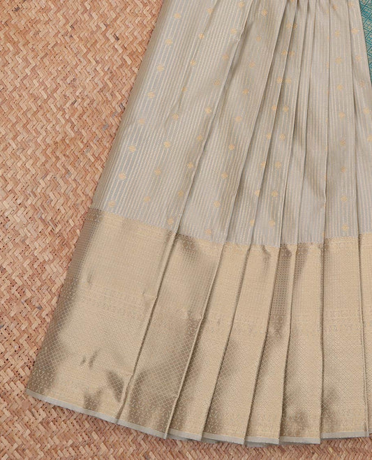 Grey Budget Silk Saree, Accentuated With Zari Buttas and Stripes All Over Its Body, Highlighted by Traditional Zari Designs Woven Border, Contrast Jaal Pallu and Paired with a Contrast Blouse