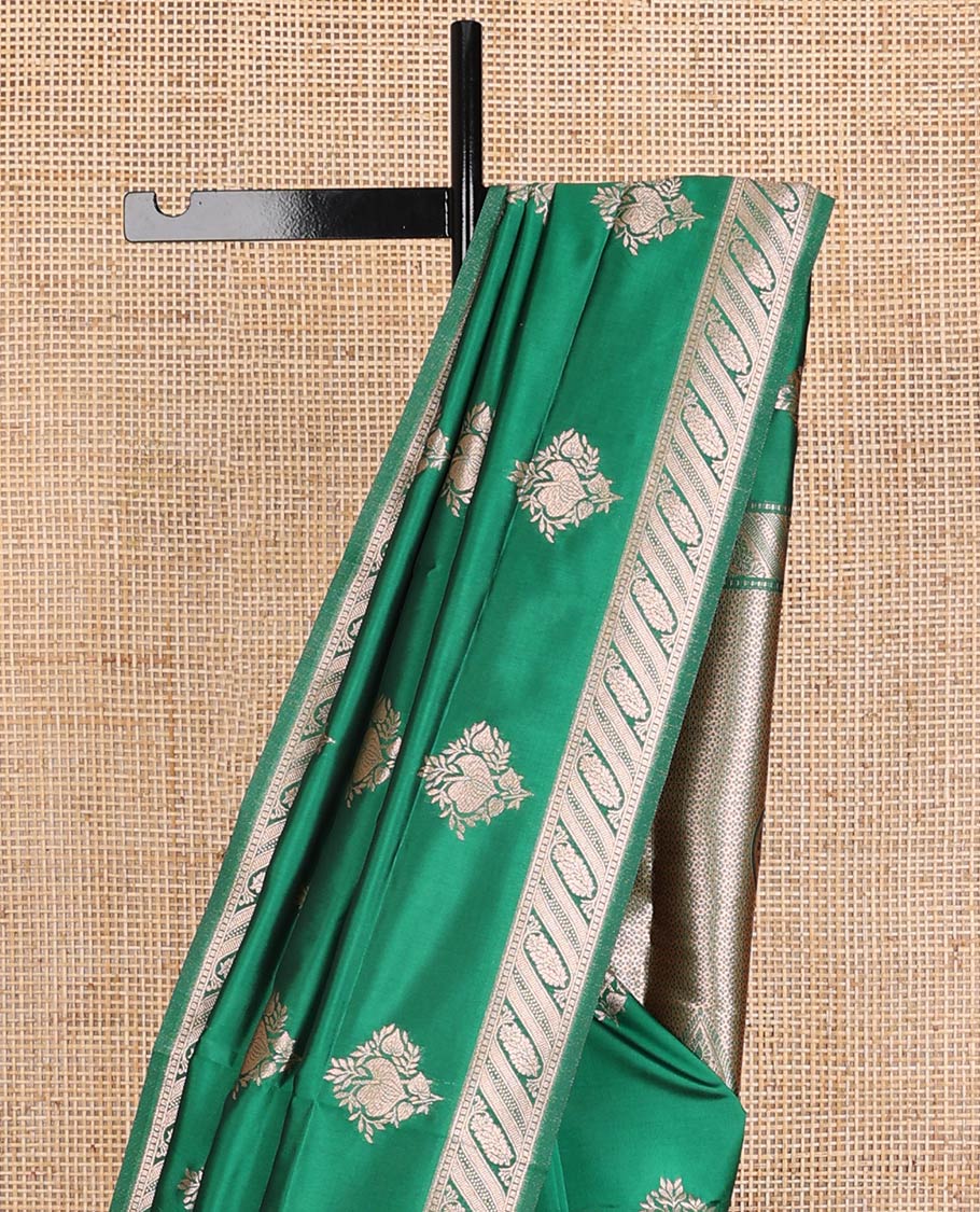 Green butter silk saree with zari buttas, floral zari design border & intricate pallu