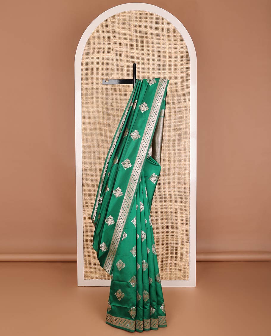 Green butter silk saree with zari buttas, floral zari design border & intricate pallu
