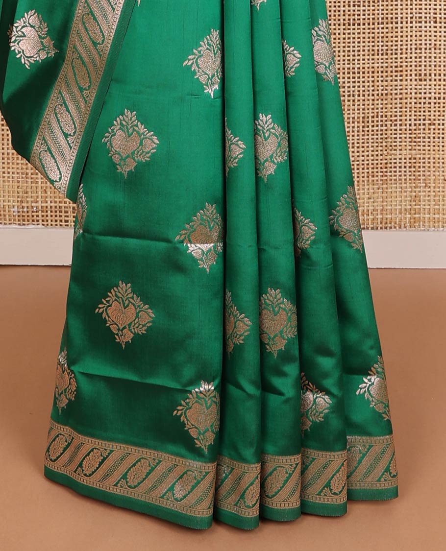 Green butter silk saree with zari buttas, floral zari design border & intricate pallu