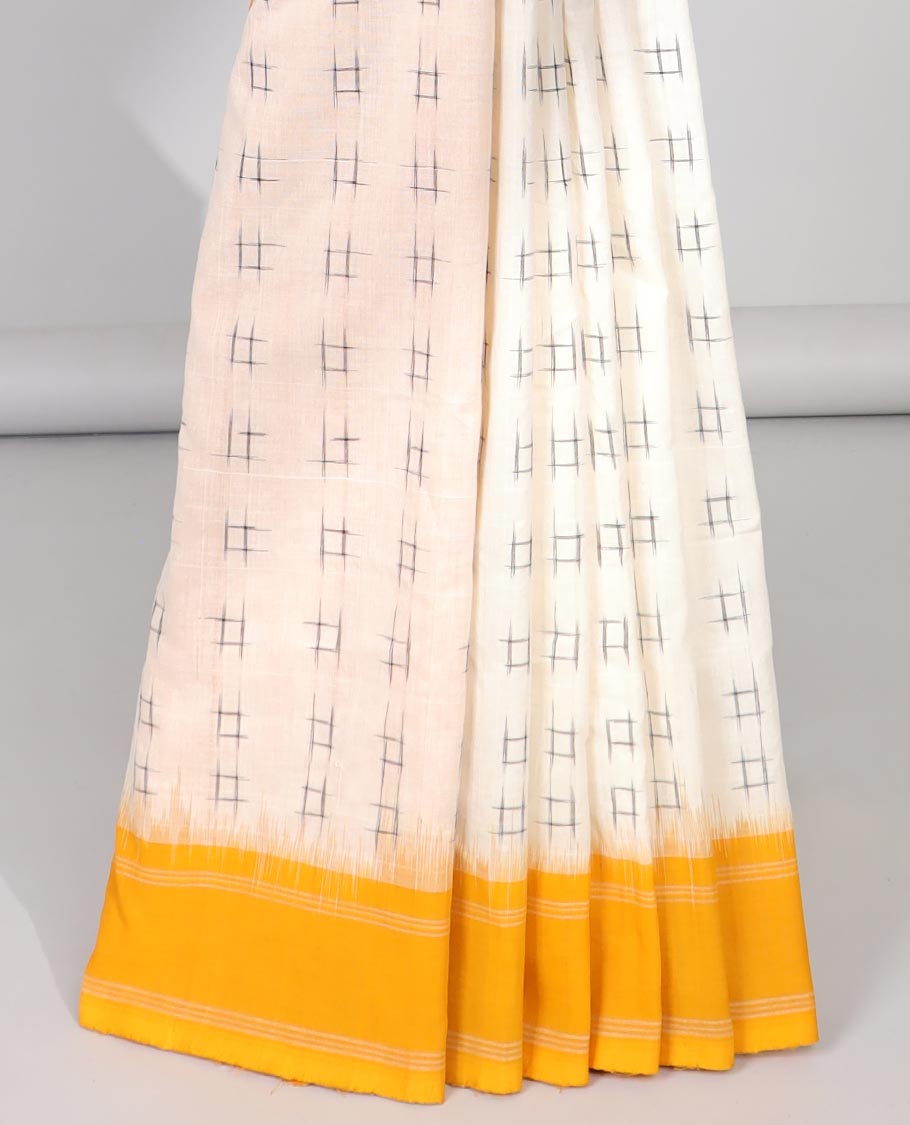 Cream checks ikkat cotton saree with contrast plain border & striped design pallu