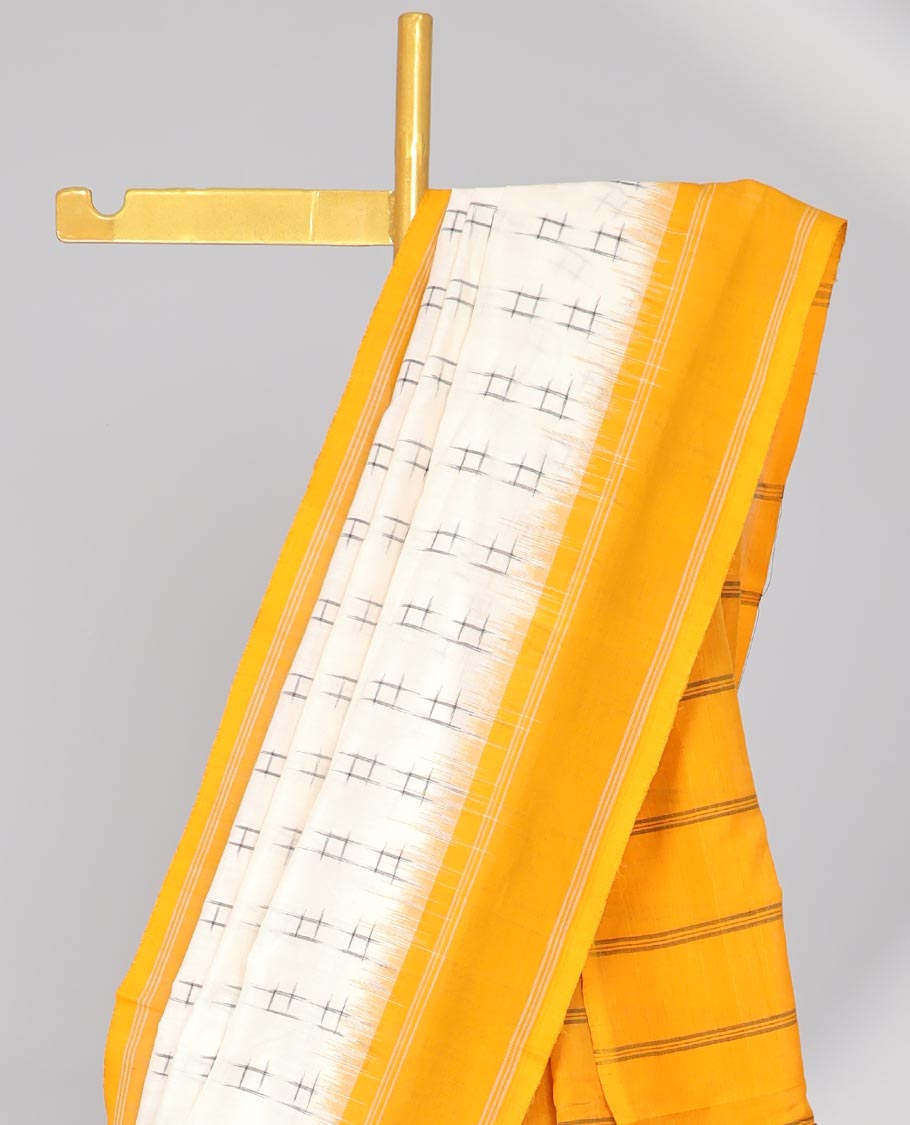 Cream checks ikkat cotton saree with contrast plain border & striped design pallu