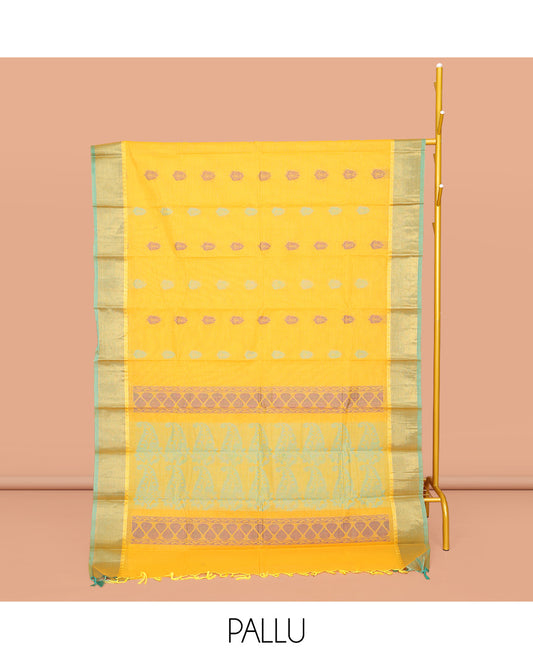 Yellow Kanchi Cotton Saree, Woven with Buttas All Over Its Body, Complemented by Contrast Border, Pallu of Paisleys and Drop Designs, and Paired with a Matching Blouse