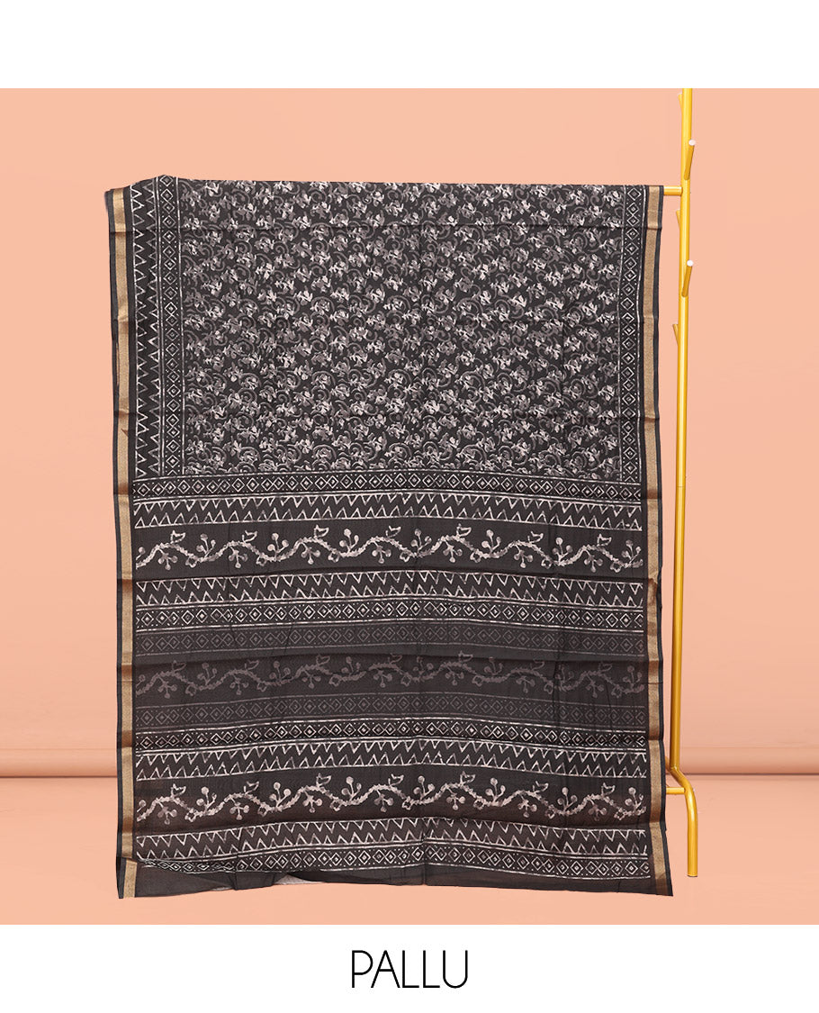 Black Kanchi Cotton Saree, Decked Up with Floral Print All Over Its Body, a Subtle Self-Border, Pallu of Block Printed Geometric Designs, and Paired with a Contrast Blouse