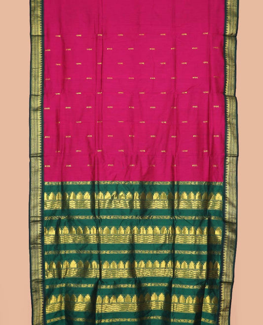Rani milk pink striped nine-yard cotton saree, contrast zari border, and pallu steeped with traditional motifs