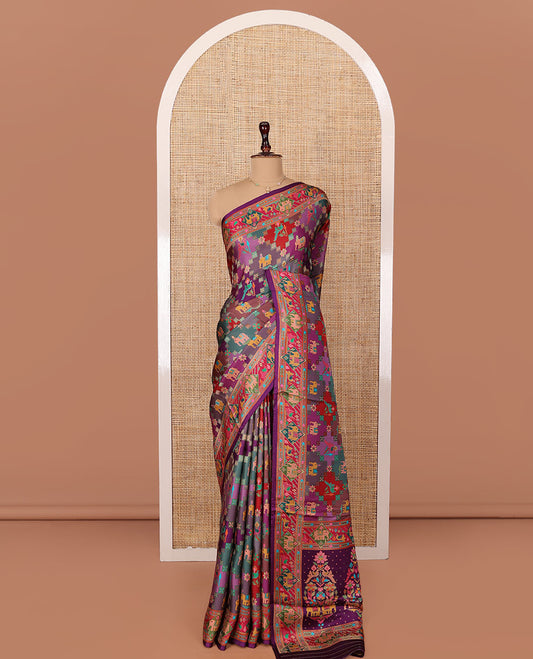 Multi-Color Dola Silk Saree, Artfully Designed with Kaleidoscope-Colored Patola Prints, Captivating Multi-Colored Printed Border, Multi-Colored Patola Printed Pallu, and Paired with a Matching Blouse