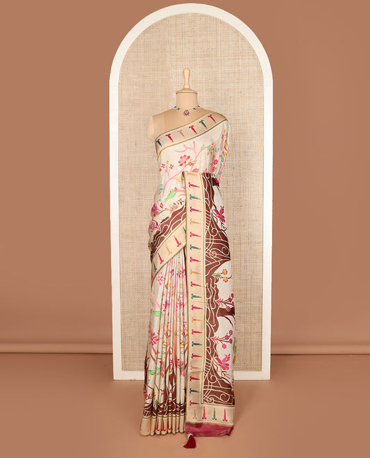 Cream colorful floral vine printed dola silk saree, muniya border, and tropical floral printed pallu