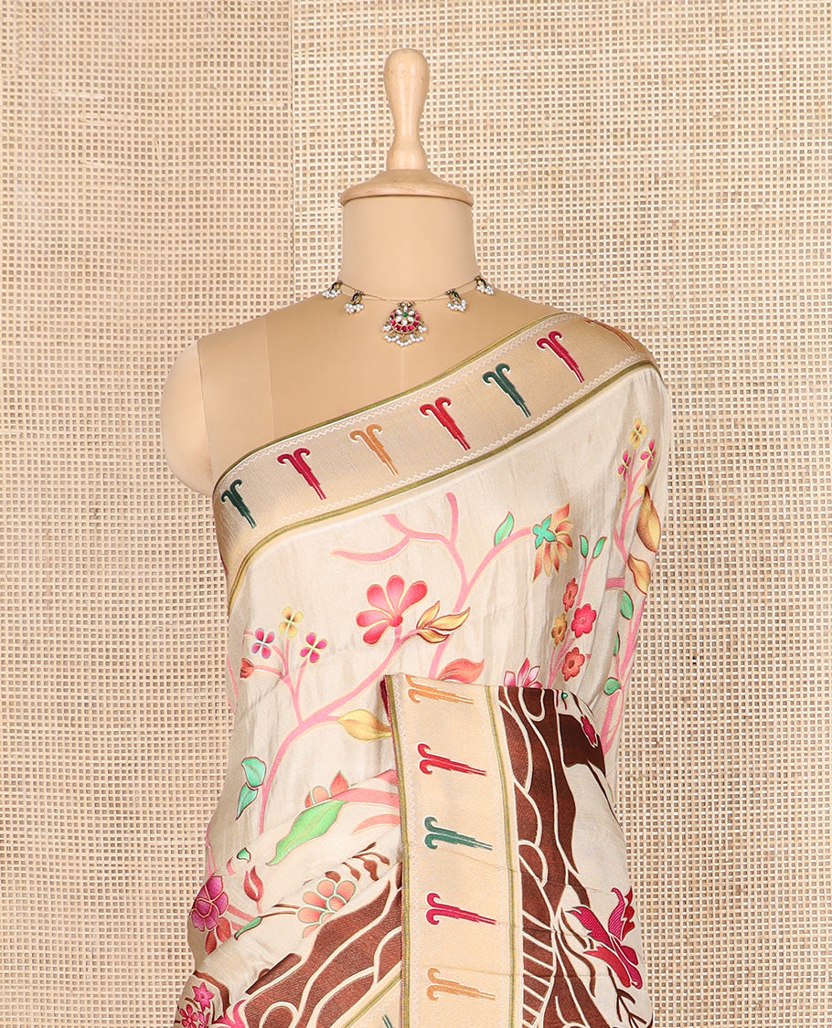 Cream colorful floral vine printed dola silk saree, muniya border, and tropical floral printed pallu