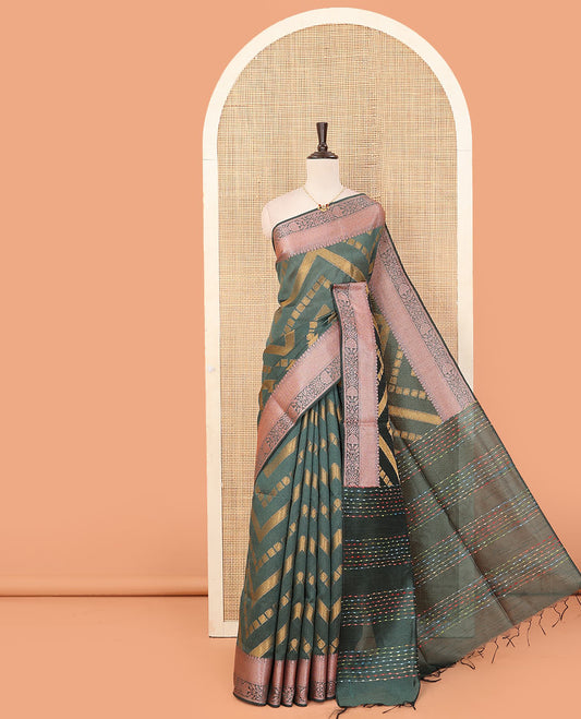 Green chevron striped dupion saree, intricate floral design border, and colorful thread striped pallu