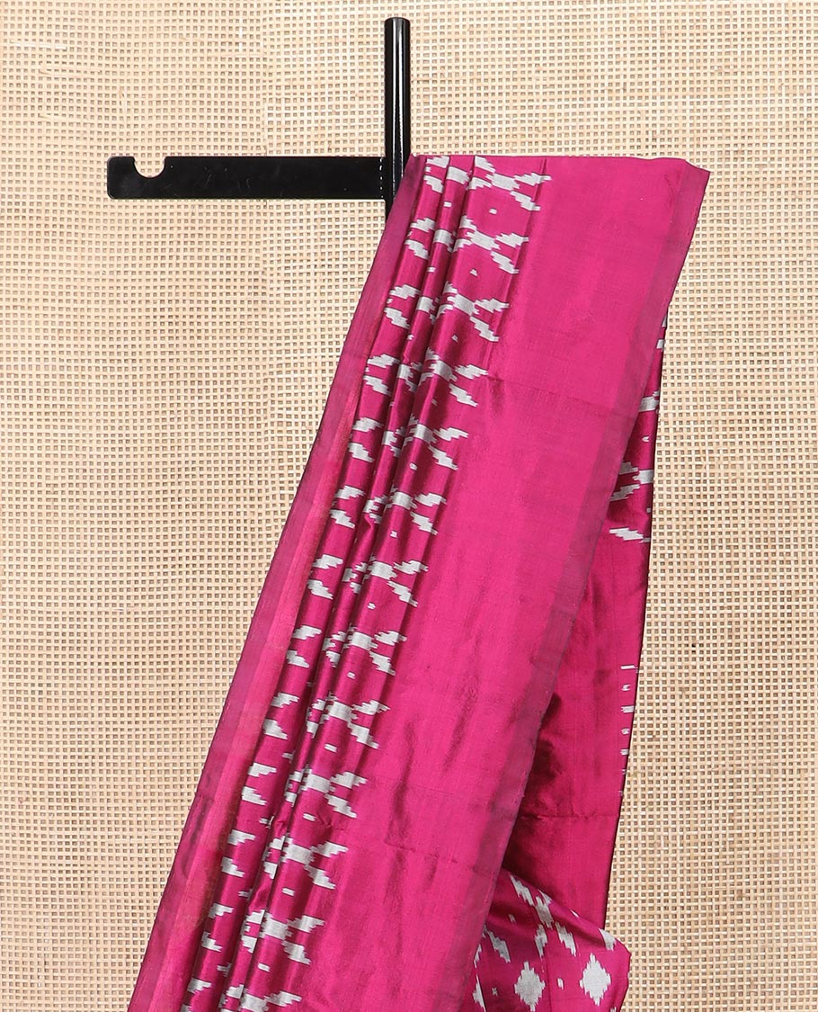 Purple Ikkat Silk Saree Decked with Ikkat Buttas, Featuring a Subtle Plain Border, Complemented by a Pallu Woven in an Ogee Pattern with Ikkat Texture