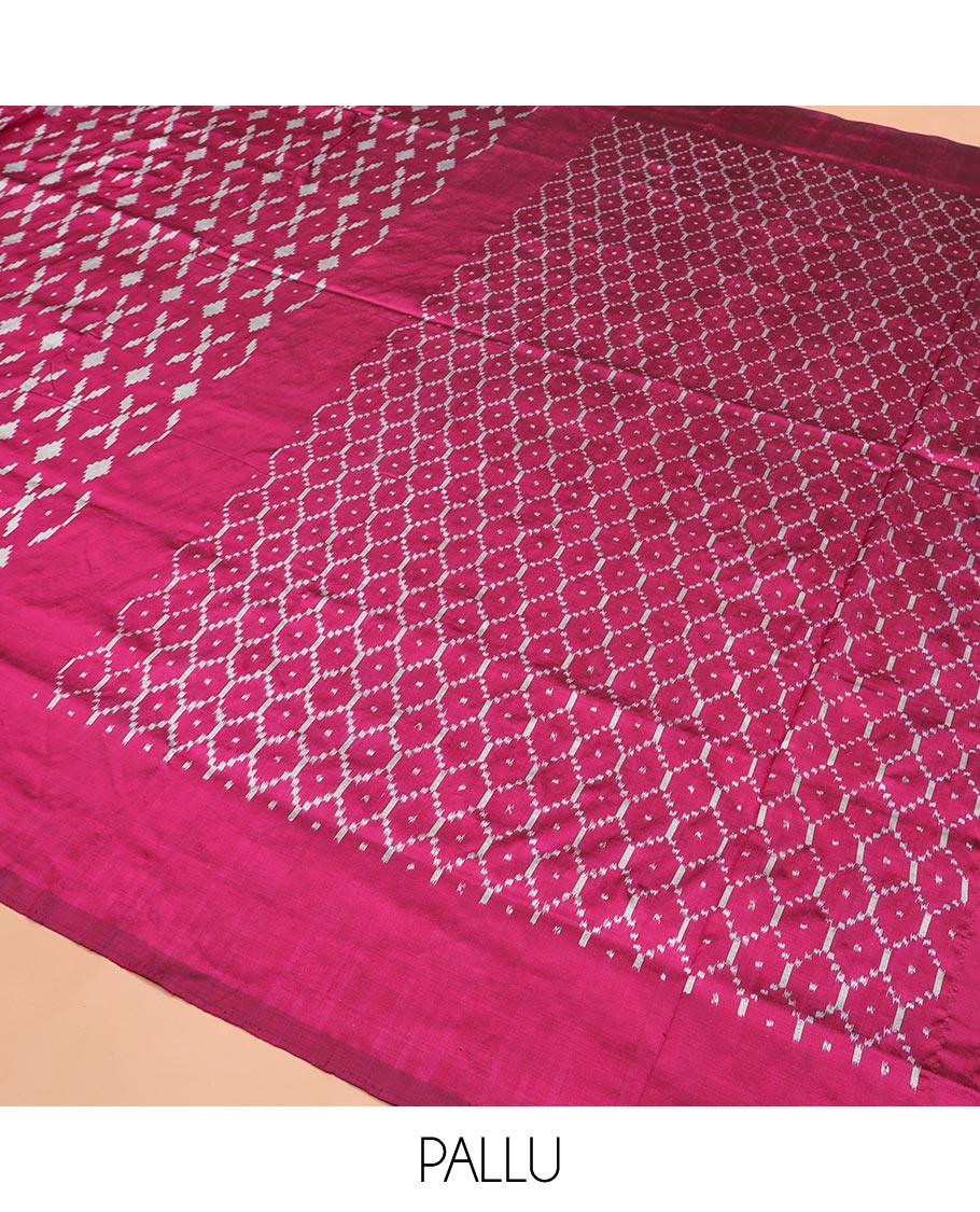 Purple Ikkat Silk Saree Decked with Ikkat Buttas, Featuring a Subtle Plain Border, Complemented by a Pallu Woven in an Ogee Pattern with Ikkat Texture