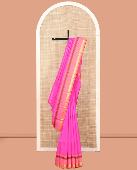 Pink Plain Kanchipuram Silk Saree, a Contrast One-Sided Rettai Pettu Border of Panner Sombu, Banaras, and Mayil Kann Designs, a Zari Design Pallu, and No Blouse
