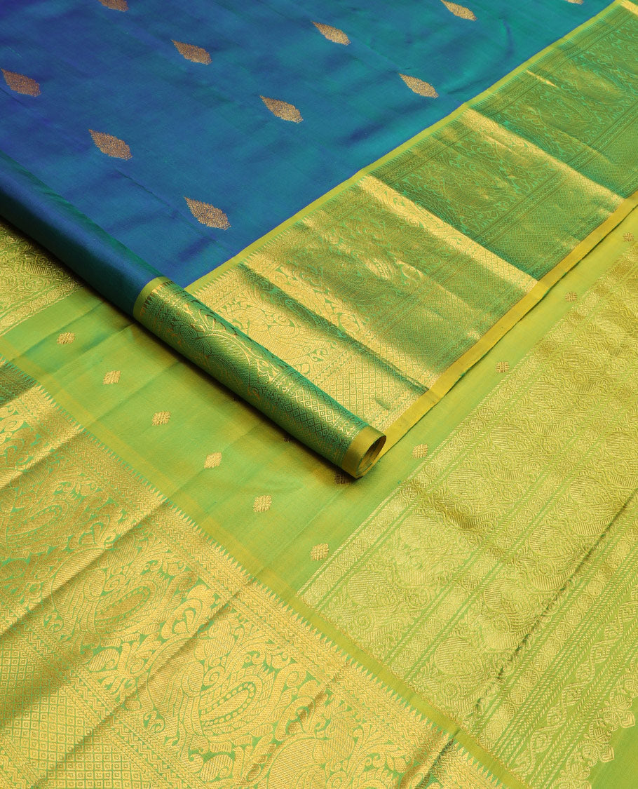 Blue zari buttas Kanchipuram silk saree, contrast border of rekku, kathir, neli, mayil, and mayil kann designs, and  zari design pallu