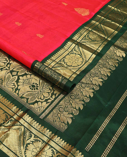 Red buttas kancheepuram silk saree with contrast border of thilakam mokku, banaras, muthu design & floral pallu