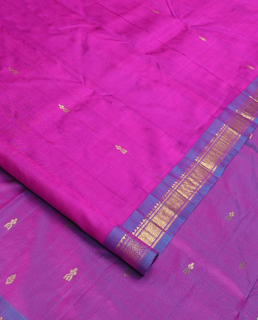 Pink zari buttas Kanchipuram silk saree, contrast one-sided border of rekku, banaras, and jaal designs, and zari design pallu