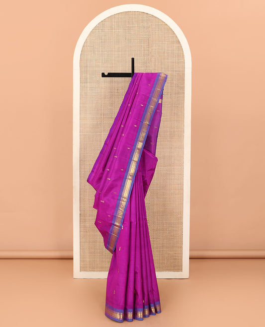 Pink zari buttas Kanchipuram silk saree, contrast one-sided border of rekku, banaras, and jaal designs, and zari design pallu