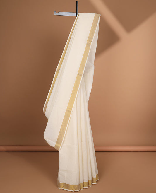 Cream plain design kerala saree, zari border & pallu of zari designs