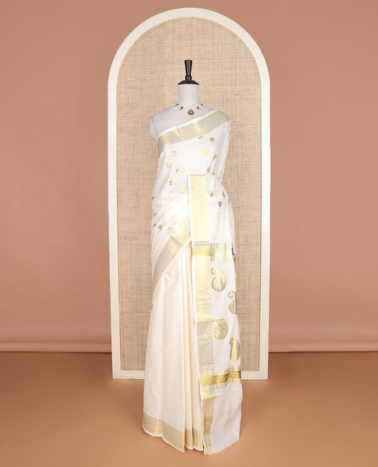 Cream paisley zari buttas Kerala cotton saree, paisley zari border, and zari paisley pallu