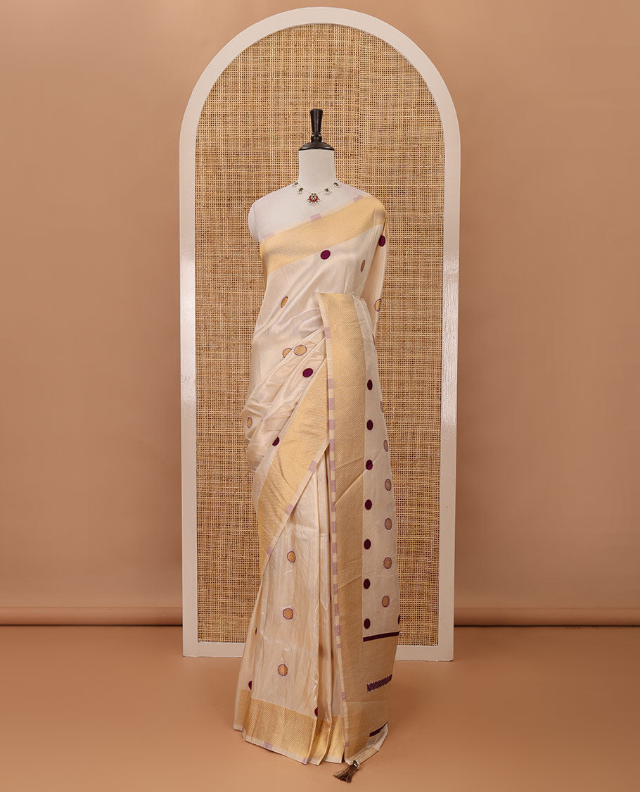 Cream small violet polka dots banarasi tissue saree, zari border, pallu of violet polka dots & running plain blouse