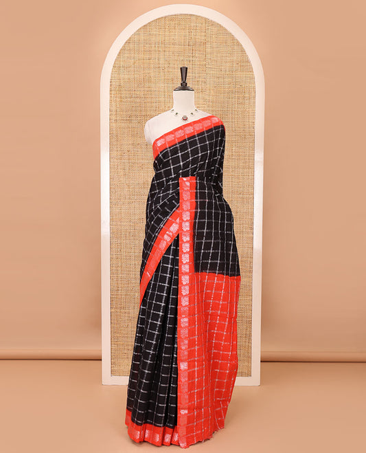 Brown zari checked sungudi cotton saree, contrast orange border of zari peacock motifs & checked peacock motif orange blouse