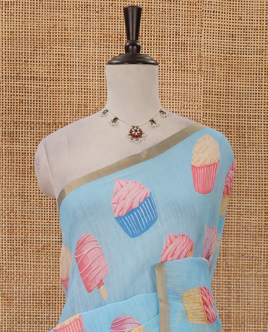 Pastel blue cupcake & Ice Cream motifs printed Linen saree, piping border, contrast Cone Ice Cream motif printed pallu & pink printed blouse