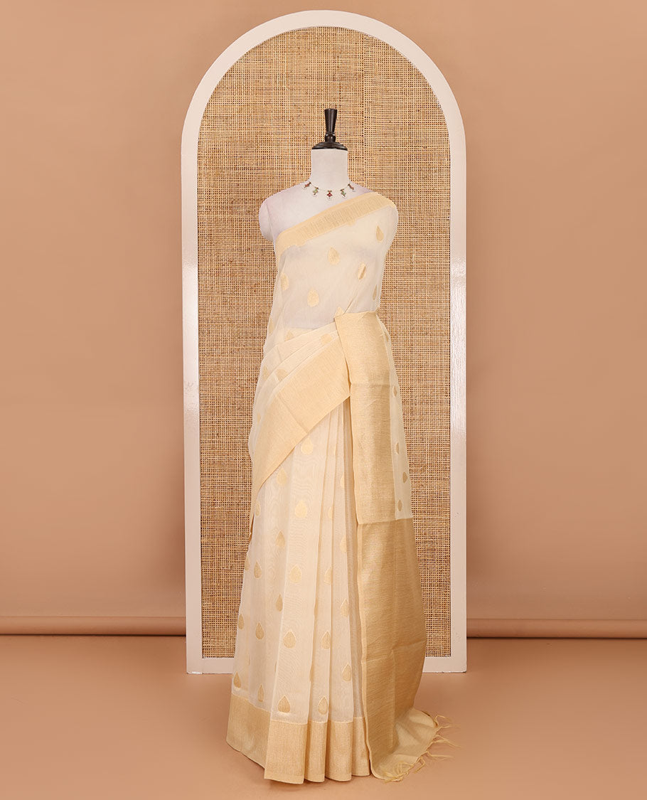 Cream gold zari thilakam motifs woven Tissue chanderi saree, gold zari bavanji border, plain pallu & brocade blouse