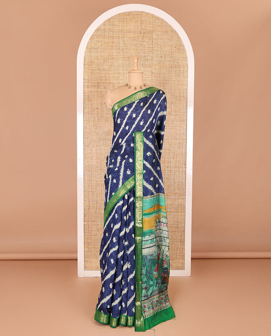 Blue batik style lehariya stripes printed muslin silk saree, contrast peacock zari woven border, Mughal inspired painting style motifs printed pallu and a contrast blouse