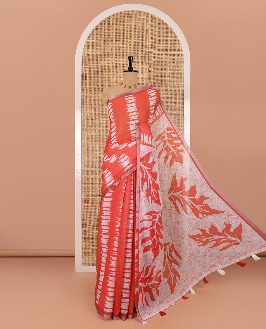 Rust shibori-dye style printed linen cotton saree, piping border, batik leaf printed pallu and a contrast batik printed blouse