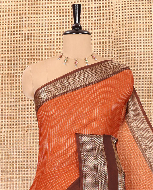 Rust orange checked moss chiffon saree with contrast traditional zari design border, checked pallu, and a contrast zari design blouse