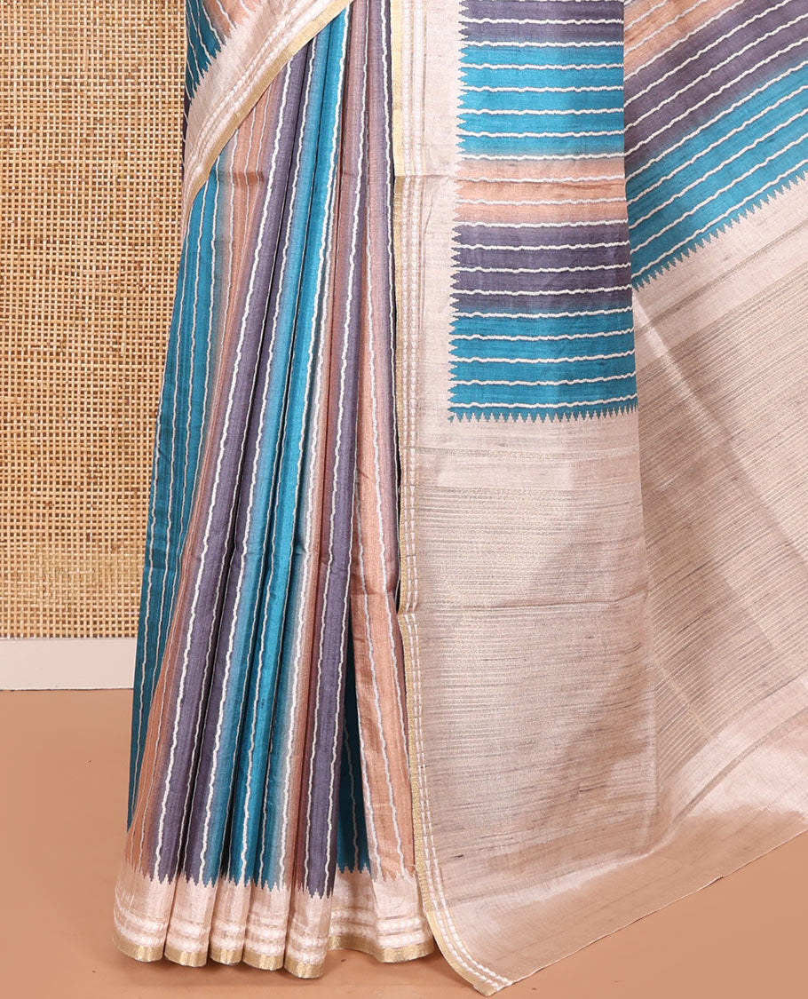 Blue Semi-Tussar Saree Colorfully Printed with Zig-Zag Stripes, Subtly Woven with a Resham Thread Temple Border, Featuring a Heathered Pallu, Paired with a Contrast Striped Blouse
