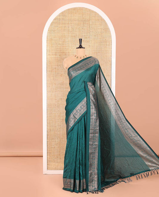 Green Plain Vichitra Silk Saree Subtly Sparked with Self-Border Featuring Traditional Designs, Plain Pallu, and Comes Without Blouse