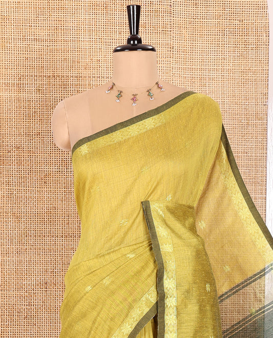 Lemon Yellow Kota Cotton Saree Prettified with Star-Style Zari Motifs All Over Its Body, Complemented by a Self-Border of Star Motifs, a Captivating Contrast Pallu of the Same Star Motifs, and a Contrast Blouse
