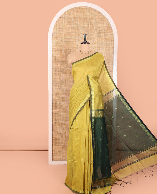 Lemon Yellow Kota Cotton Saree Prettified with Star-Style Zari Motifs All Over Its Body, Complemented by a Self-Border of Star Motifs, a Captivating Contrast Pallu of the Same Star Motifs, and a Contrast Blouse