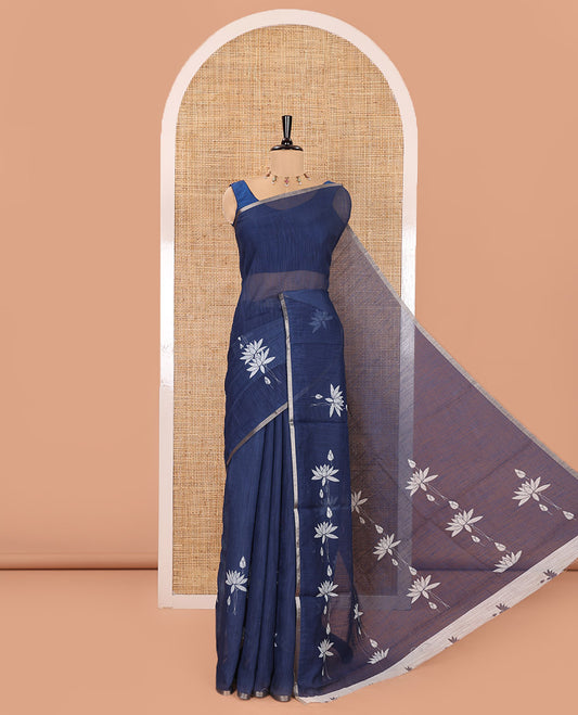 Navy Blue Linen Cotton Saree, Beautified with Pichwai Lotus Motifs Print, Subtle Piping Border, Pallu Mirrors the Same Pichwai Lotus Print, and Paired with a Contrast Pichwai Lotus Printed Blouse